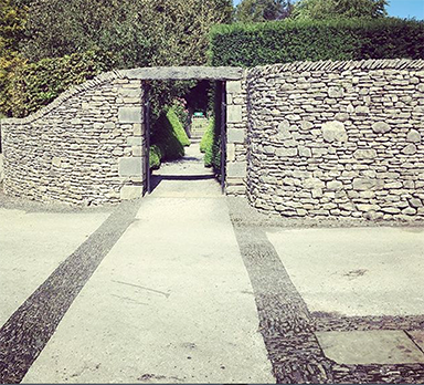Cobbles and walls create beautiful garden design at Levens Hall